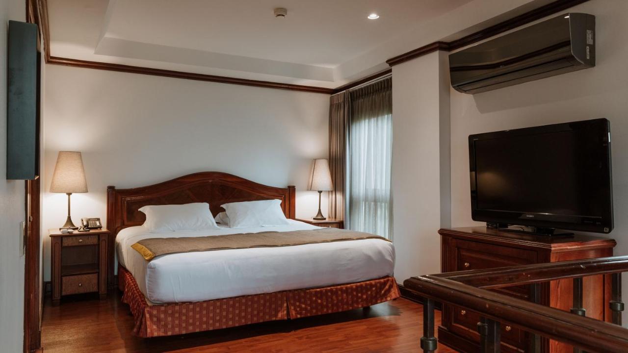 Hotel Park10 Medellín Exteriér fotografie A bedroom at the hotel